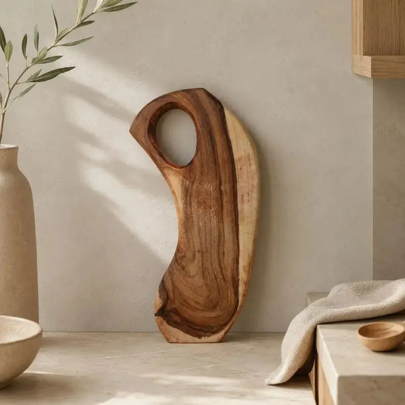 Rustic farmhouse chopping board with an irregular edge.