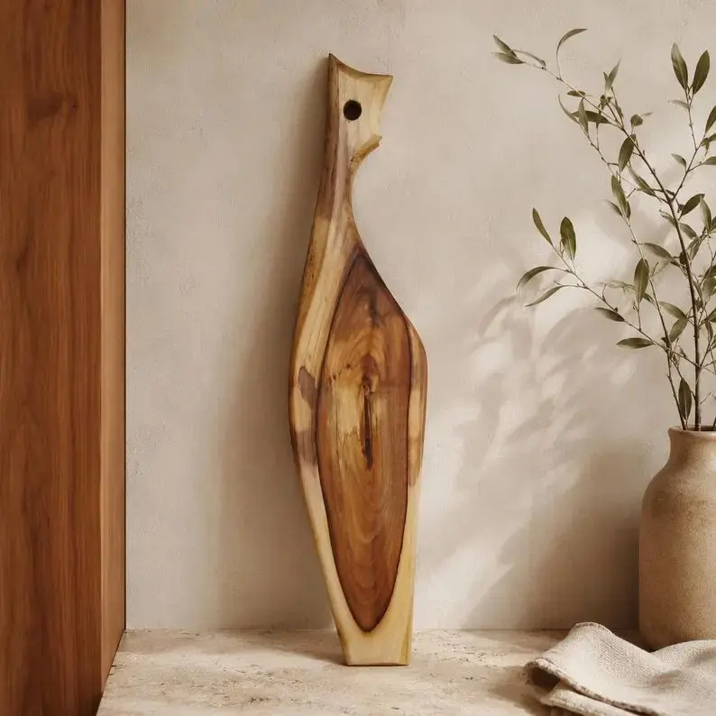 Handmade cutting board variants in different natural wood shapes.